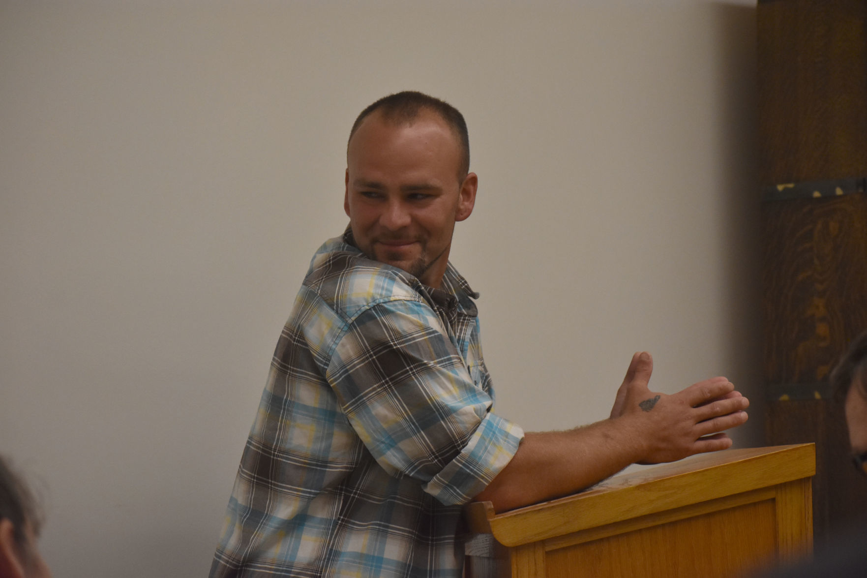 Charles Leofilos smiles at family